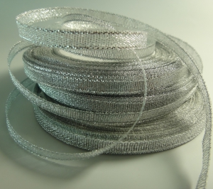 Ленгта парча 0,7 см, в  рулоне 23 м. (Серебро).